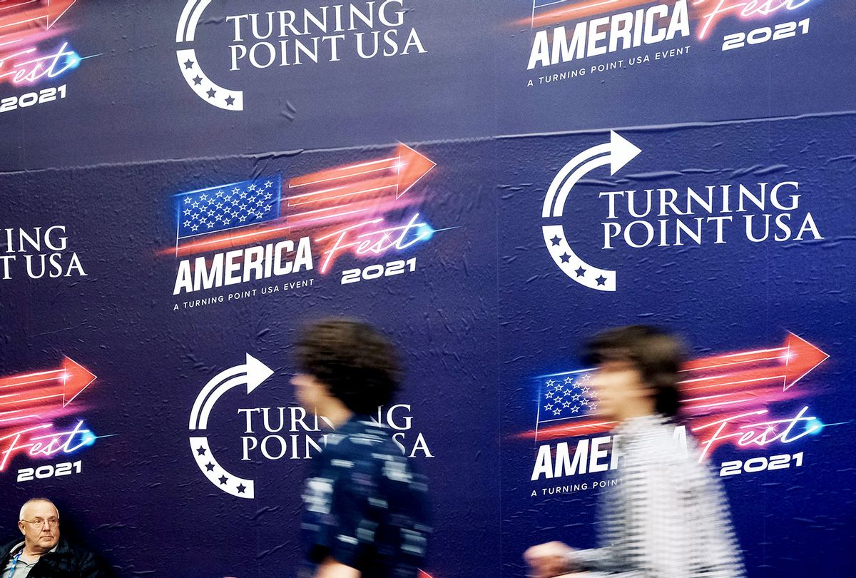 People attend Turning Point USA’s America Fest 2021, a gathering of conservative’s and Donald Trump supporters, on December 18, 2021 in Phoenix, Arizona. The four-day event, held at a convention center in downtown Phoenix, features some of the nation’s most popular conservative speakers including Tucker Carlson and Donald Trump Jr. Some of the conference's sponsors include The Heritage Foundation, Fox Nation, and Young Americans for Liberty. AmericaFest 2021 will run Saturday through Tuesday. (Spencer Platt/Getty Images)