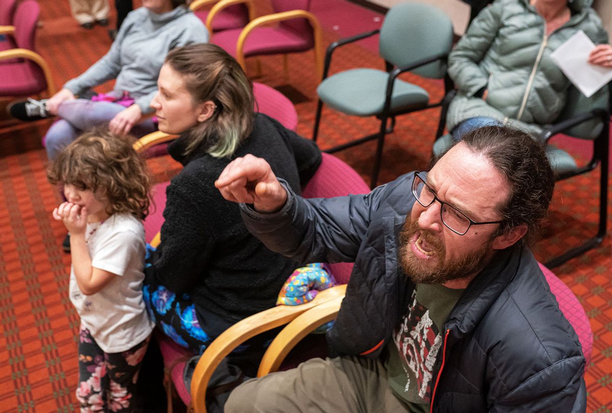 Angry parents reacts in objection during a Portland Public Schools board meeting to discuss a proposed vaccine mandate for students on October 26, 2021 in Portland, Oregon. (Nathan Howard/Getty Images)