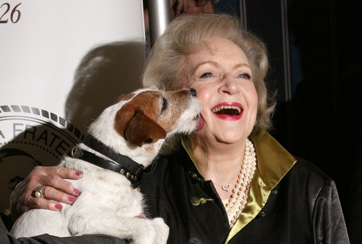 Betty White and Uggie the dog attend The Friars Club Salute To Betty White at Sheraton New York Hotel & Towers on May 16, 2012 in New York City (Jim Spellman/WireImage)