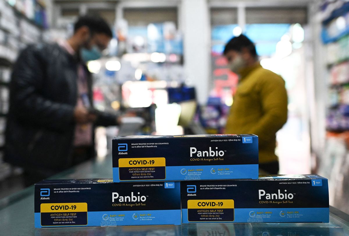 In this photo illustration Covid-19 rapid antigen self-test kits from Abbot company is displayed at a pharmacy in New Delhi on January 11, 2022. (SAJJAD HUSSAIN/AFP via Getty Images)