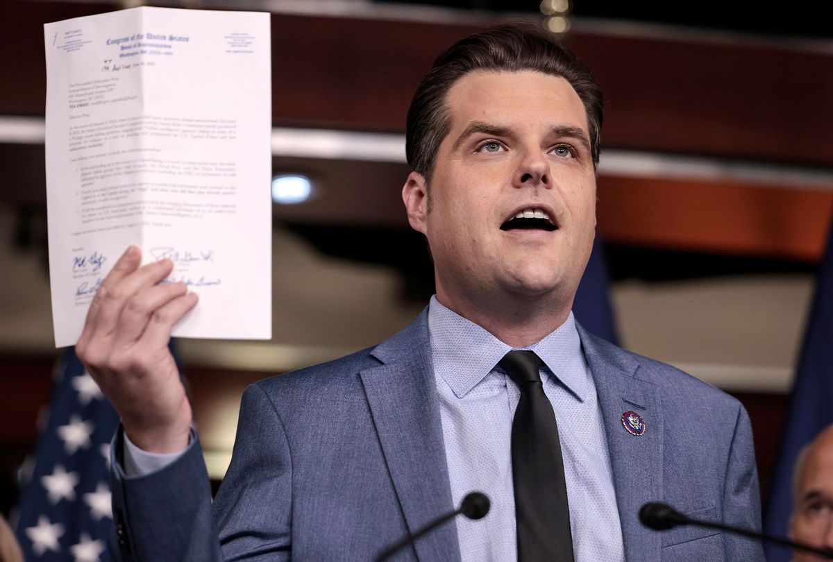 U.S. Rep. Matt Gaetz (R-FL) holds up a letter to FBI Director Christopher Wray at a news conference at the Capitol Building on December 07, 2021 in Washington, DC. (Anna Moneymaker/Getty Images)