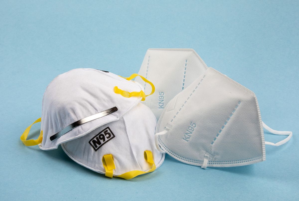 N95 respirator and KN95 respirator mask PPE for protection against COVID-19 (Getty Images/sockagphoto)