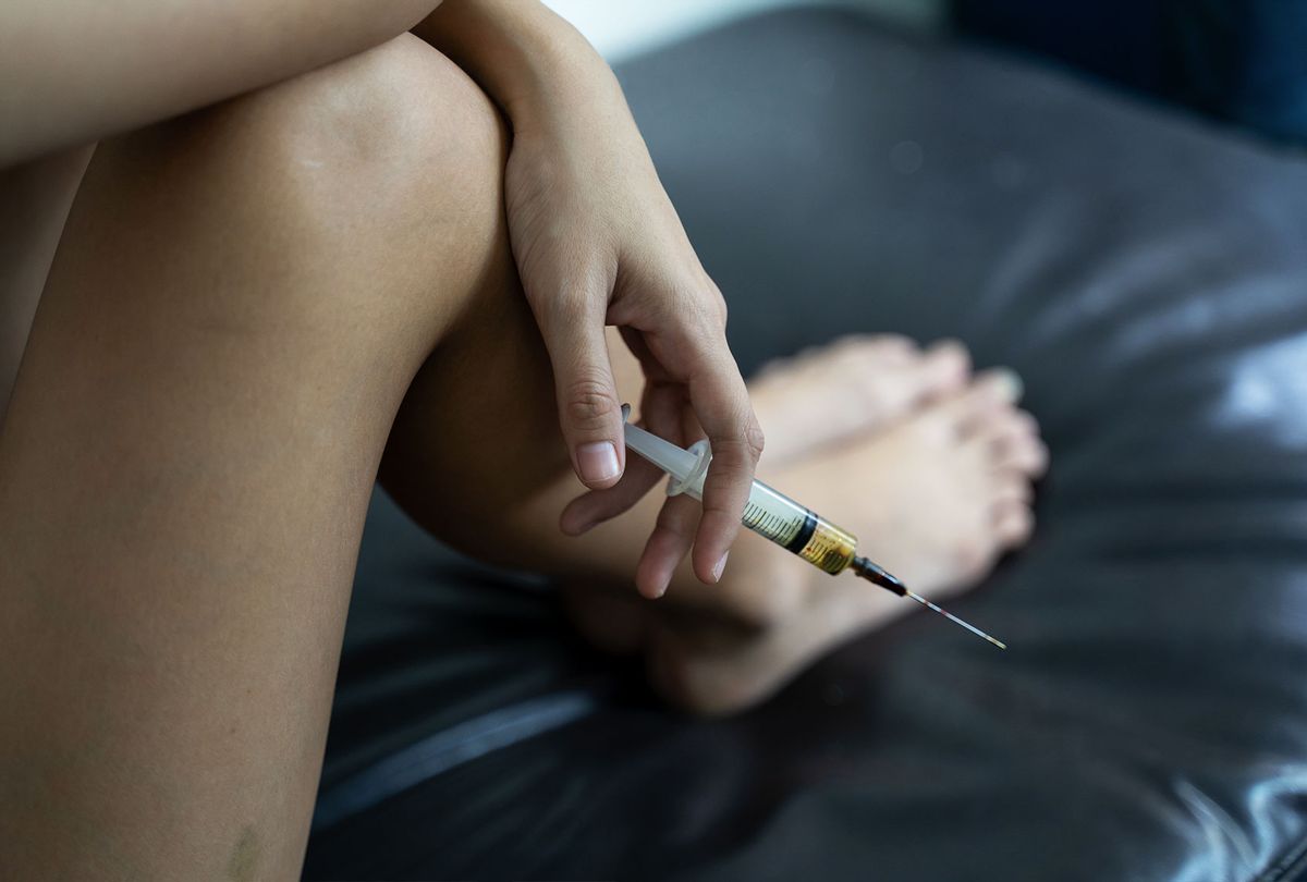 Young woman with drug addiction (Getty Images/seksan Mongkhonkhamsao)
