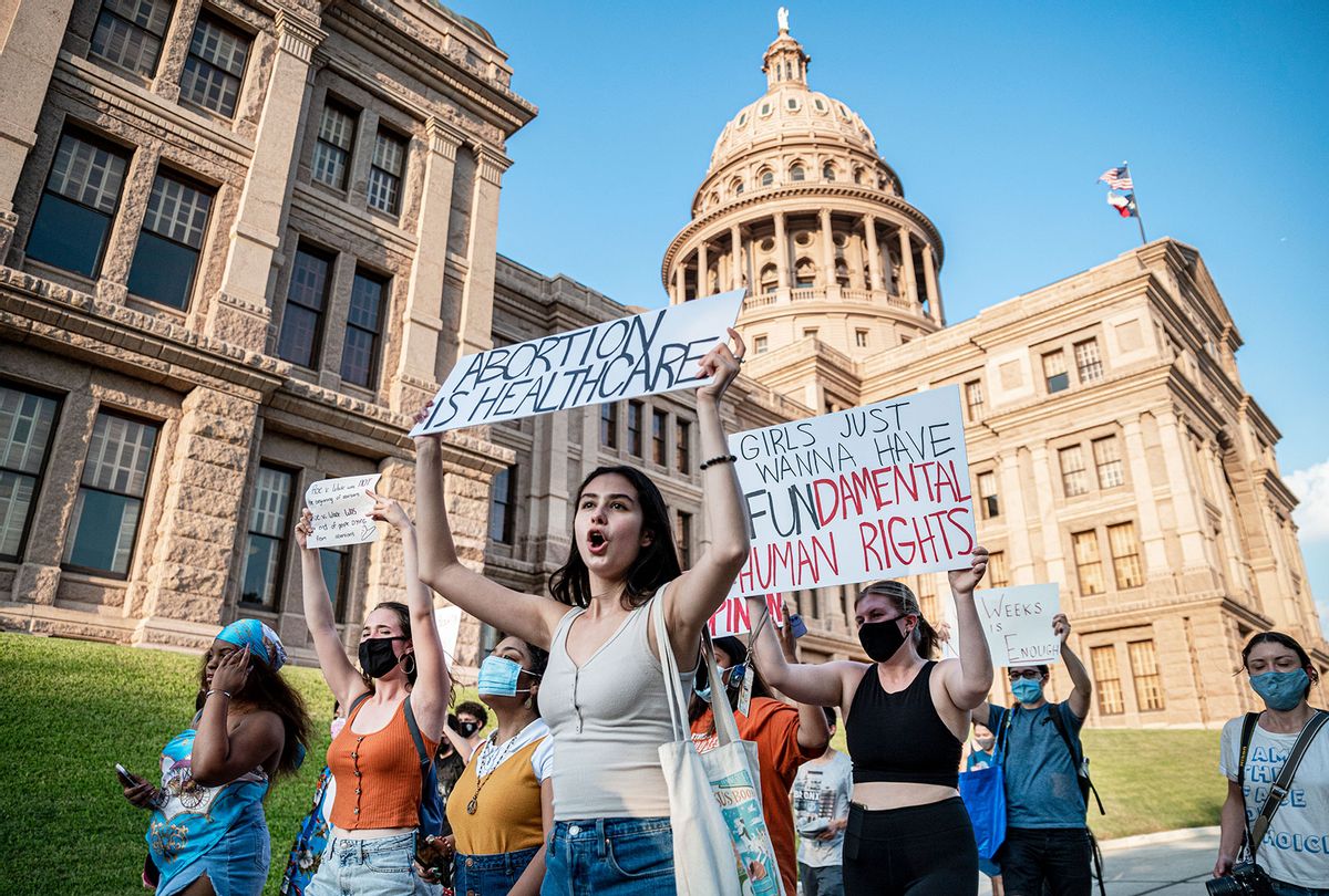 Pro-choice protesters march outside the Texas State Capitol on Wednesday, Sept. 1, 2021 in Austin, TX. Texas passed SB8 which effectively bans nearly all abortions and it went into effect Sept. 1. A request to the Supreme Court to block the bill went unanswered and the Court still has yet to take any action on it. (Sergio Flores For The Washington Post via Getty Images)