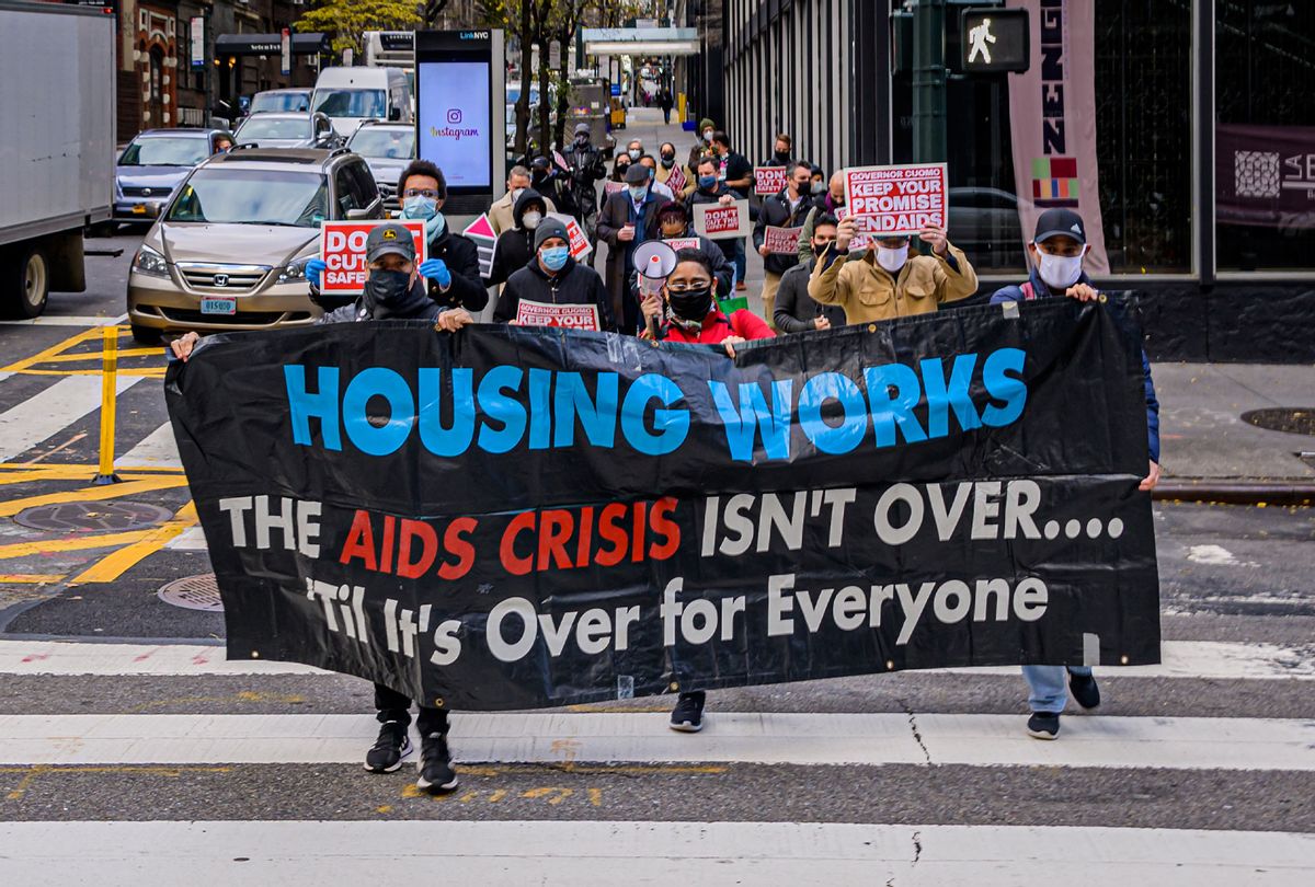 A participant seen holding a Housing Works banner at the protest. On World AIDS Day, the End AIDS New York Community Coalition gathered outside Governor Cuomo's offices in Manhattan, to convene at a rally and press conference, demanding Governor Cuomo to make good on his commitment to end AIDS as an epidemic in New York State, in a full and equitable manner that eliminates persistent HIV health disparities based on race, poverty, and marginalized identities. (Erik McGregor/LightRocket via Getty Images)