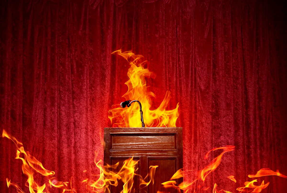 A podium on stage, on fire (Photo illustration by Salon/Getty Images)