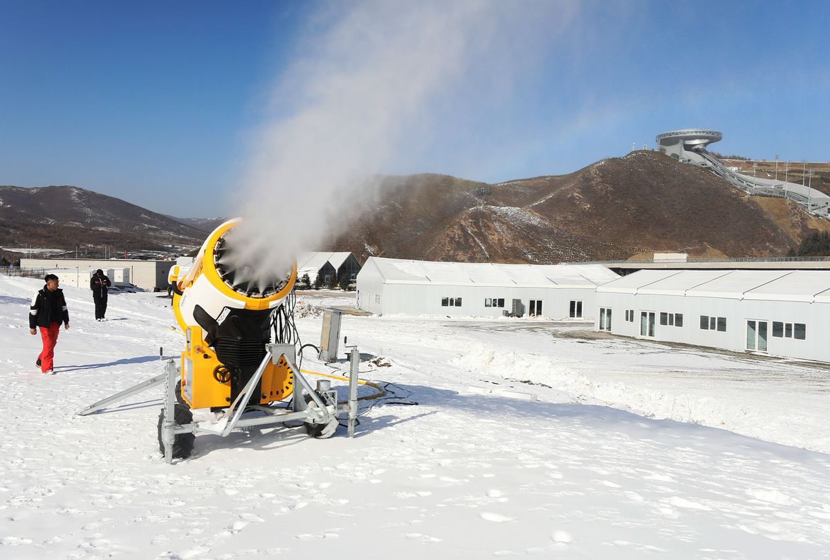 A snowmaking machine works at the National Cross-Country Skiing Centre, a venue for the cross-country skiing and Nordic combined events of Beijing 2022 Winter Olympics, on November 15, 2021 in Zhangjiakou, Hebei Province of China. (Wu Diansen/VCG via Getty Images)