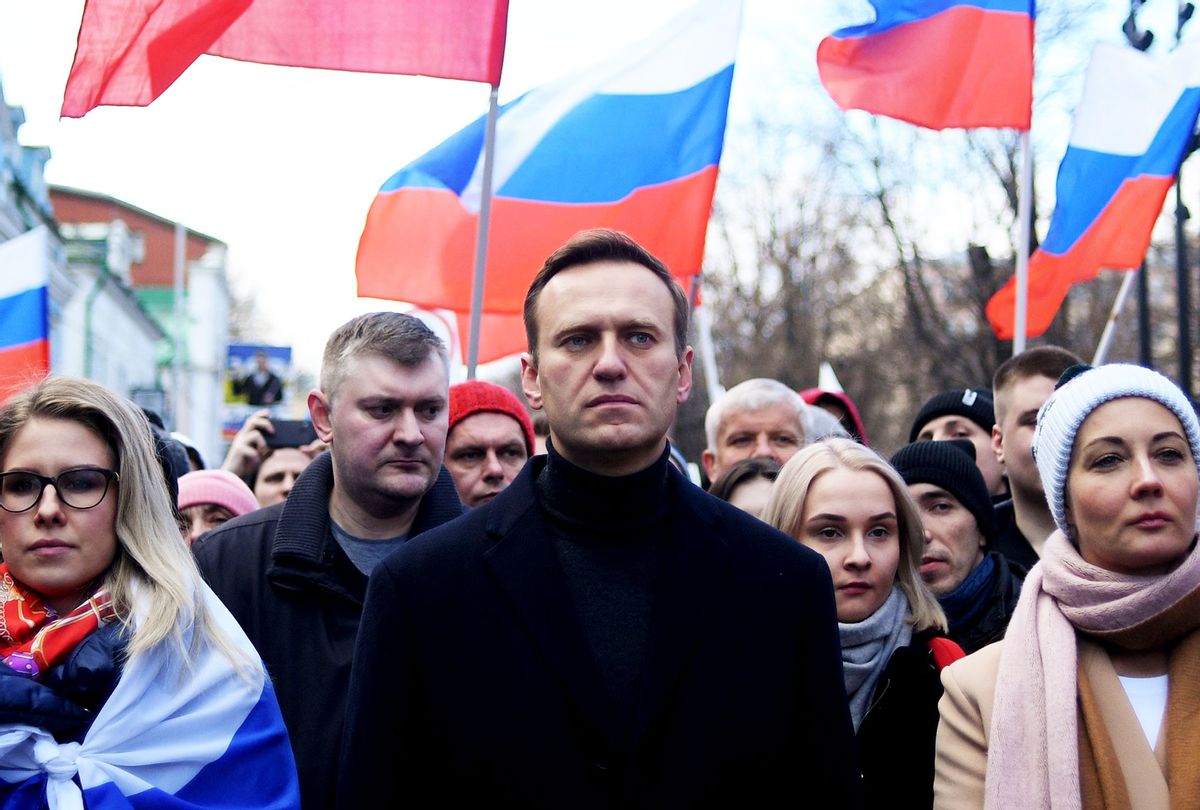 Russian opposition leader Alexei Navalny, his wife Yulia, opposition politician Lyubov Sobol and other demonstrators march in memory of murdered Kremlin critic Boris Nemtsov in downtown Moscow on February 29, 2020. (KIRILL KUDRYAVTSEV/AFP via Getty Images)