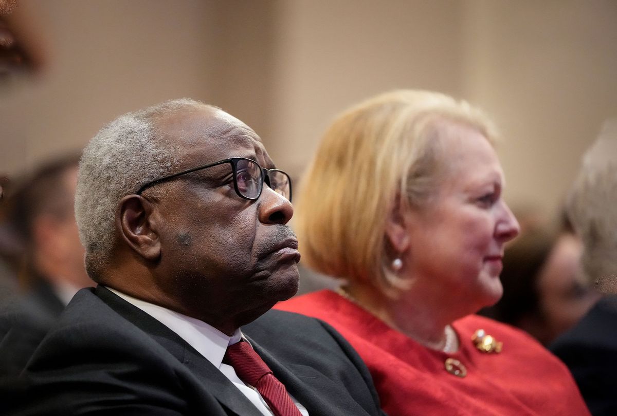 Associate Supreme Court Justice Clarence Thomas sits with his wife and conservative activist Virginia Thomas while he waits to speak at the Heritage Foundation on October 21, 2021 in Washington, DC. (Drew Angerer/Getty Images)