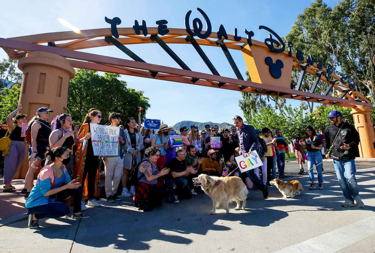 LGBTQ employees protesting CEO Bob Chapek's handling of the staff controversy over Florida's "Don't Say Gay" bill, gather for a group photo at the entrance of Walt Disney Company on Tuesday, March 22, 2022 in Burbank, CA. (Irfan Khan / Los Angeles Times via Getty Images)