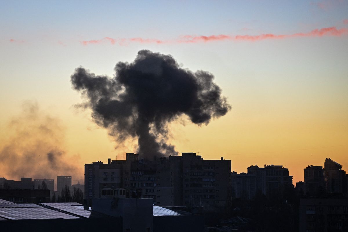 Several explosions rocked Kyiv early on March 16, according to AFP journalists in the city, with emergency services saying two residential buildings were damaged and two people wounded. The blasts came as Russia intensifies attacks on the Ukrainian capital, which was placed under curfew late March 15. (Aris Messinis/AFP via Getty Images)