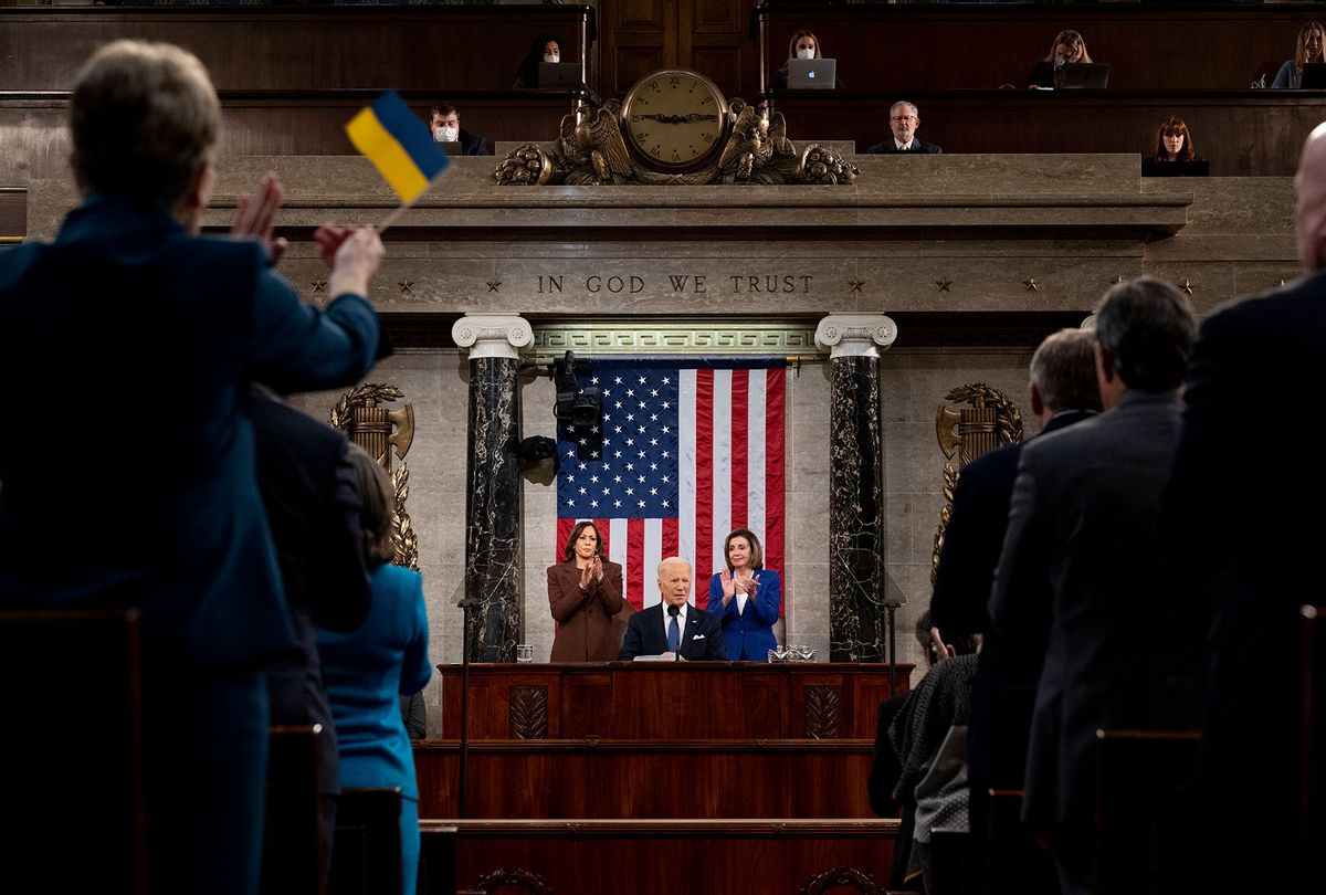 A member of the U.S. Congress waives a Ukrainian flag as President Joe Biden delivers the State of the Union address to a joint session of Congress in the U.S. Capitol House Chamber on March 1, 2022 in Washington, DC. In his first State of the Union address, Biden spoke on his administration’s efforts to lead a global response to the Russian invasion of Ukraine, work to curb inflation, and bring the country out of the COVID-19 pandemic. (Saul Loeb - Pool/Getty Images)