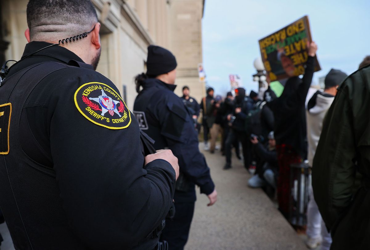 Police take security measures as BLM protesters and Kyle Rittenhouse supporters are gathered outside of the Kenosha County Courthouse awaiting verdict in Kyle Rittenhouse trial in Kenosha, Wisconsin, United States on November 16, 2021. (Tayfun Coskun/Anadolu Agency via Getty Images)