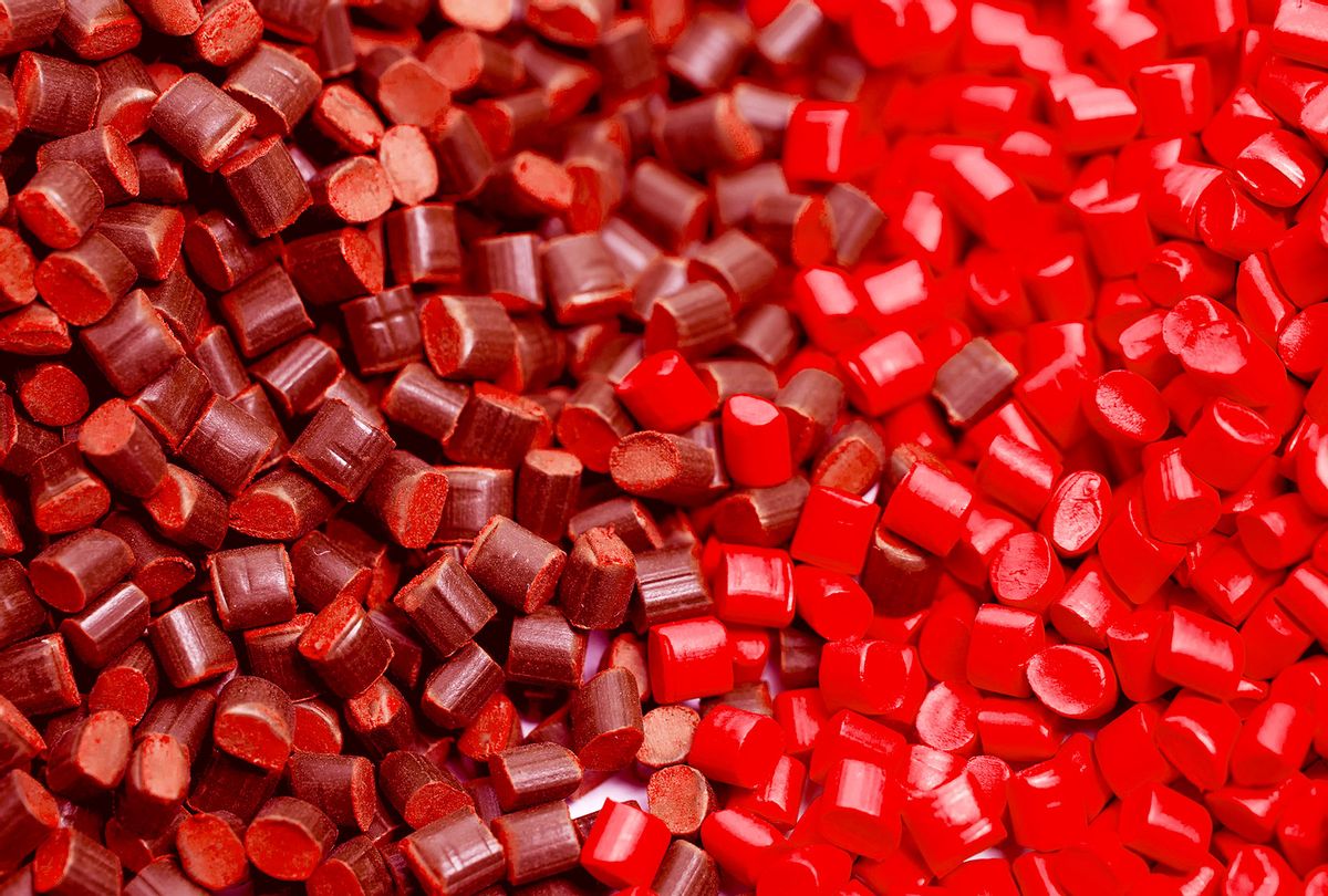 Close up of red plastic granules (Getty Images/LukaSvetic)