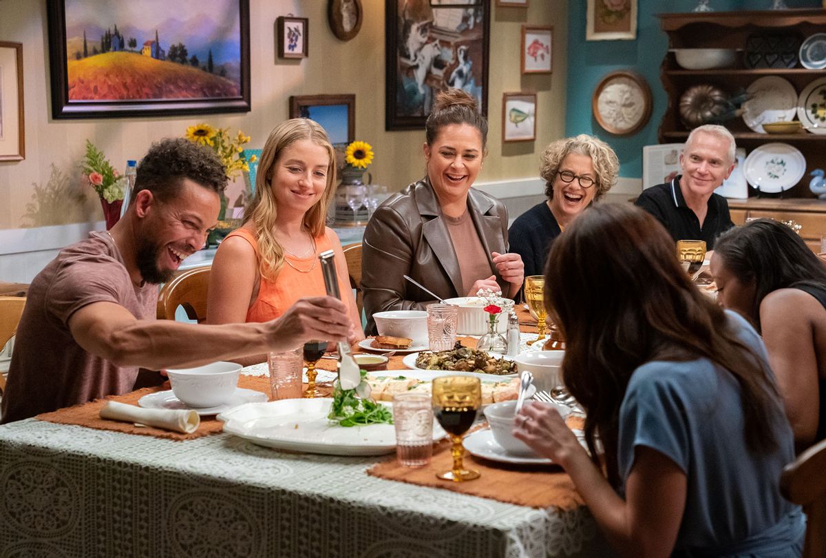 The contestants and judges sit down for a family style meal to taste the dishes from the second challenge, as seen on The Julia Child Challenge (Photo courtesy of Food Network/Discovery)