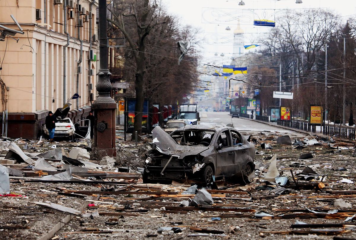 A burnt-out car is seen on the street after a missile launched by Russian invaders hit near the Kharkiv Regional State Administration building in Svobody (Freedom) Square) at approximately 8 am local time on Tuesday, March 1, Kharkiv, northeastern Ukraine. (Vyacheslav Madiyevskyy/ Ukrinform/Future Publishing via Getty Images)