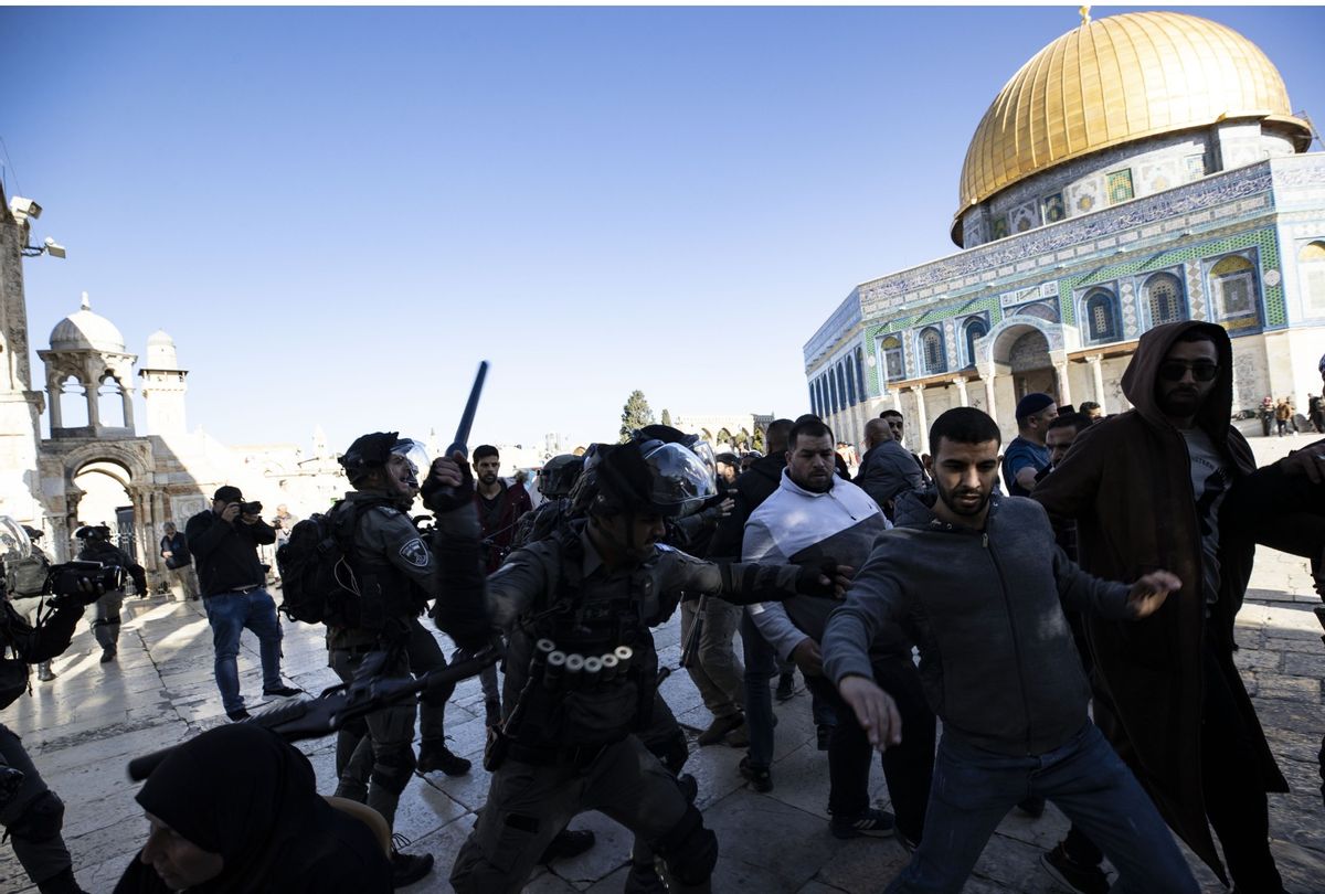 JERUSALEM - APRIL 15: Israeli forces intervene in Palestinians at Al-Aqsa Mosque after Palestinians react to the Israeli raid at Al-Aqsa Mosque in Jerusalem on April 15, 2022.  (Photo by Mostafa Alkharouf/Anadolu Agency via Getty Images)