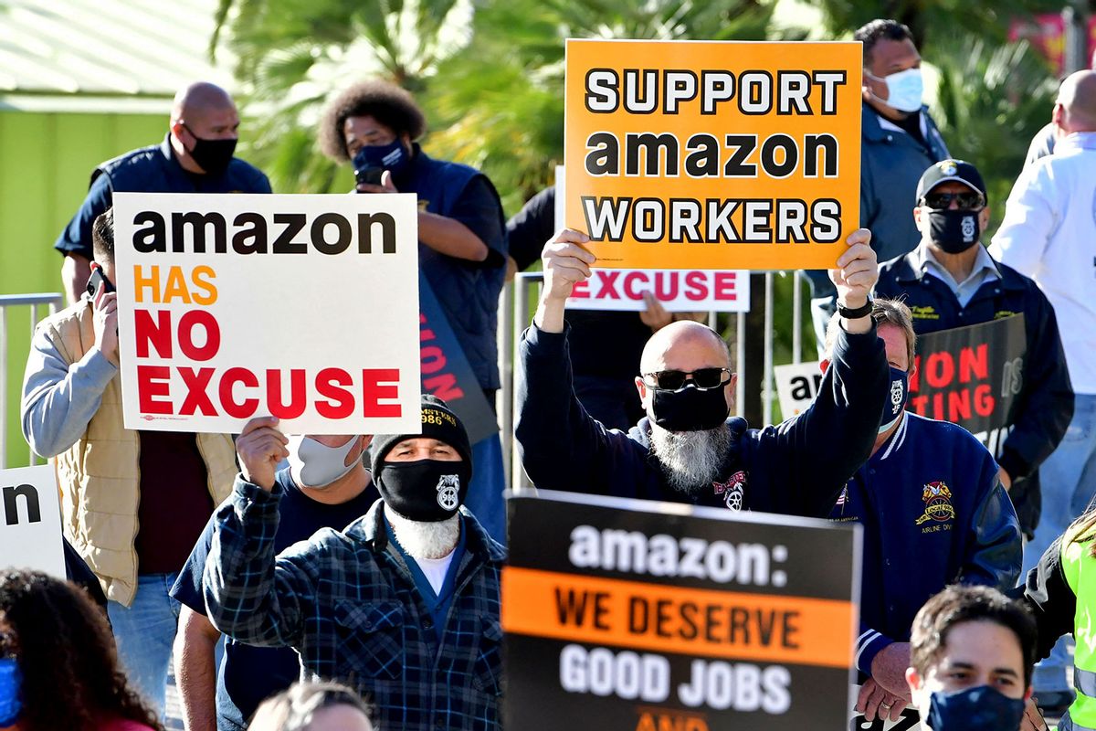 Union leaders are joined by community group representatives, elected officials and social activists for a rally in support of unionization efforts by Amazon workers in the state of Alabama on March 21, 2021 in Los Angeles, California. (FREDERIC J. BROWN/AFP via Getty Images)