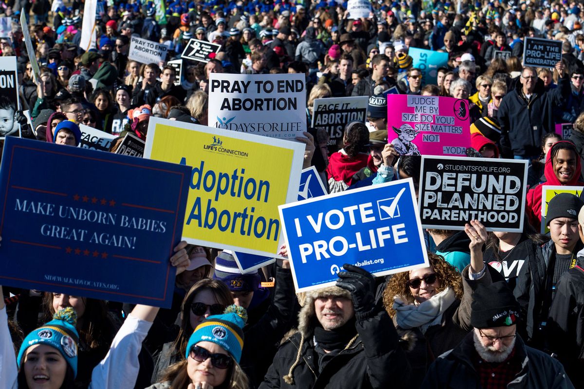 Thousands of people gather on the National Mall during the March for Life, the world's largest annual pro-life demonstration, in Washington, DC on January 19, 2018. Over one hundred thousand people are expected to attend the 45th annual March for Life event. (Carolyn Van Houten/The Washington Post via Getty Images)