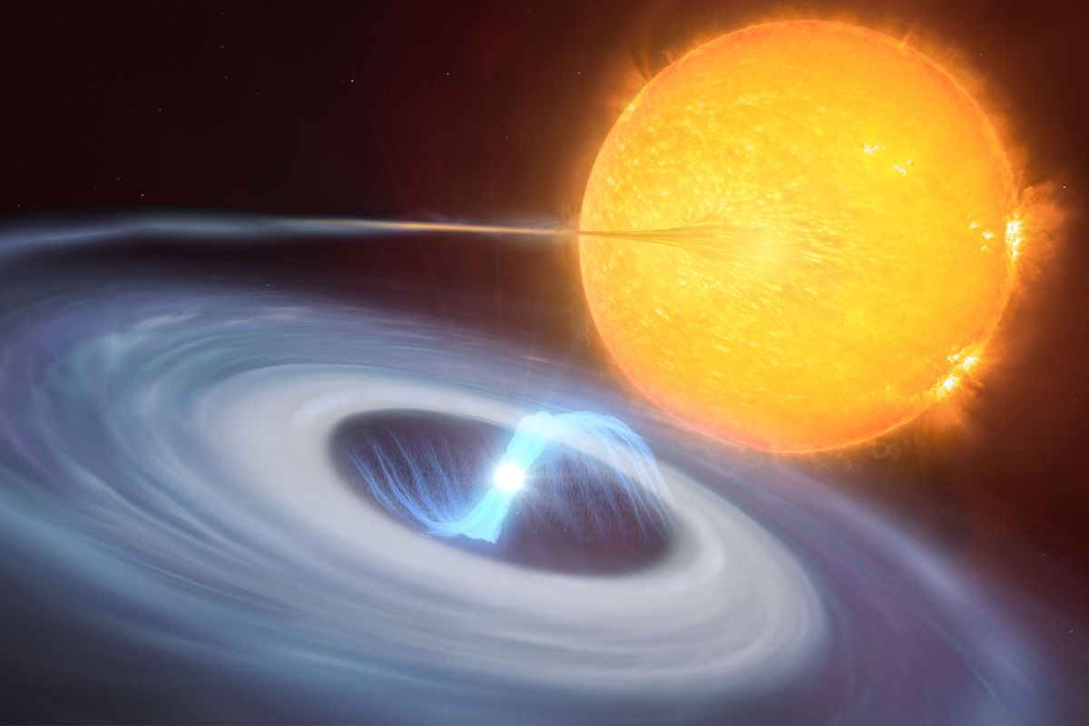 This artist’s impression shows a two-star system where micronovae may occur. The blue disc swirling around the bright white dwarf in the centre of the image is made up of material, mostly hydrogen, stolen from its companion star. As the material falls on the hot surface of the star, it triggers a micronova explosion, contained by the magnetic fields at one of the white dwarf’s poles. (ESO/M. Kornmesser, L. Calçada)