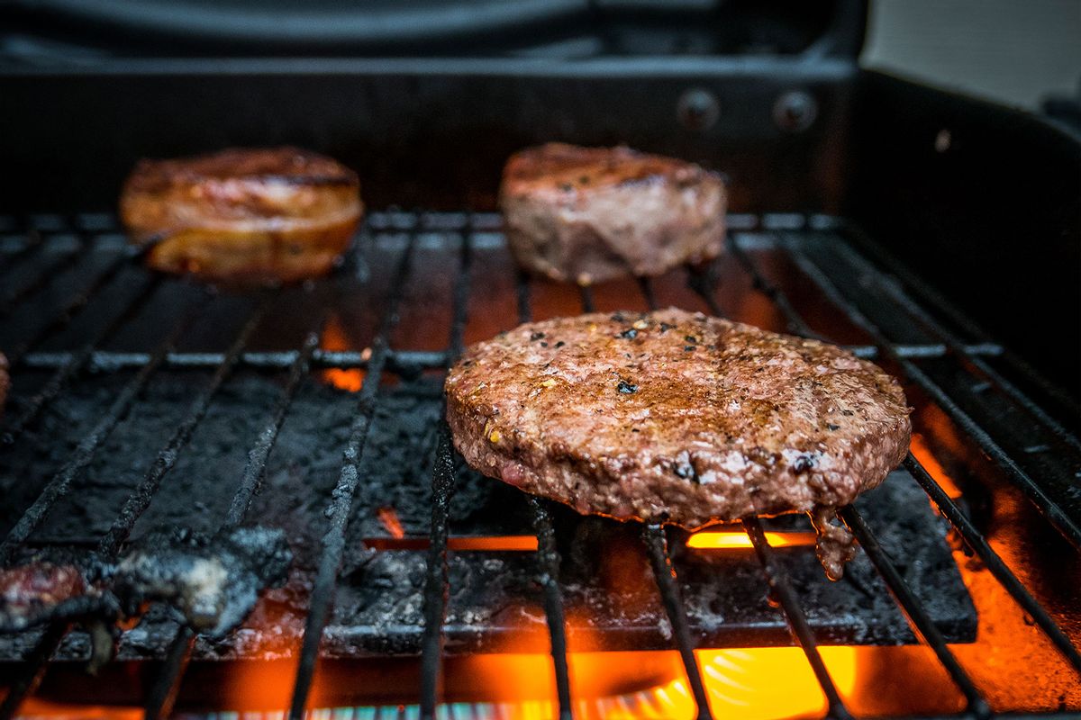 Burger Meat On Barbecue Grill (Getty Images /	Heath Cajandig / EyeEm)
