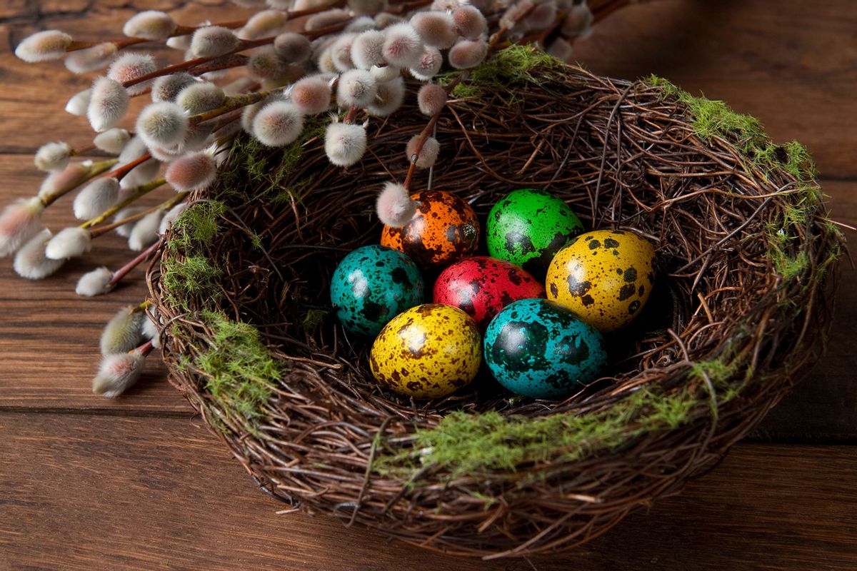 Easter eggs in the decorative nest (Getty Images/Vikusha)