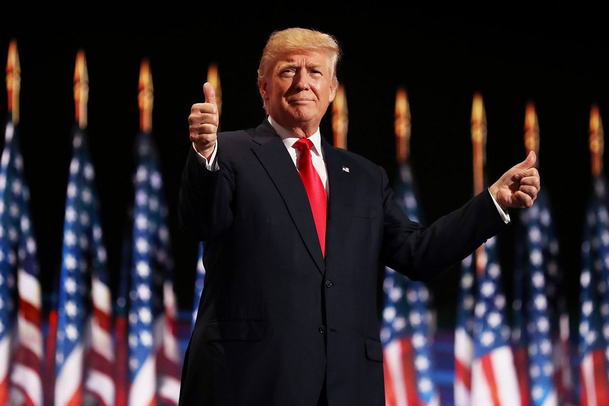 Donald Trump gives two thumbs up to the crowd during the evening session on the fourth day of the Republican National Convention on July 21, 2016 at the Quicken Loans Arena in Cleveland, Ohio. (Joe Raedle/Getty Images)