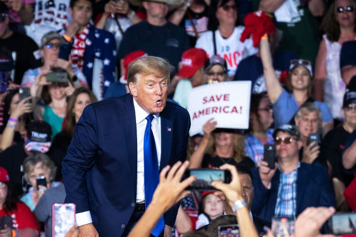 Former U.S. President Donald Trump exits the stage after speaking during a rally hosted by the former president at the Delaware County Fairgrounds on April 23, 2022 in Delaware, Ohio. (Drew Angerer/Getty Images)
