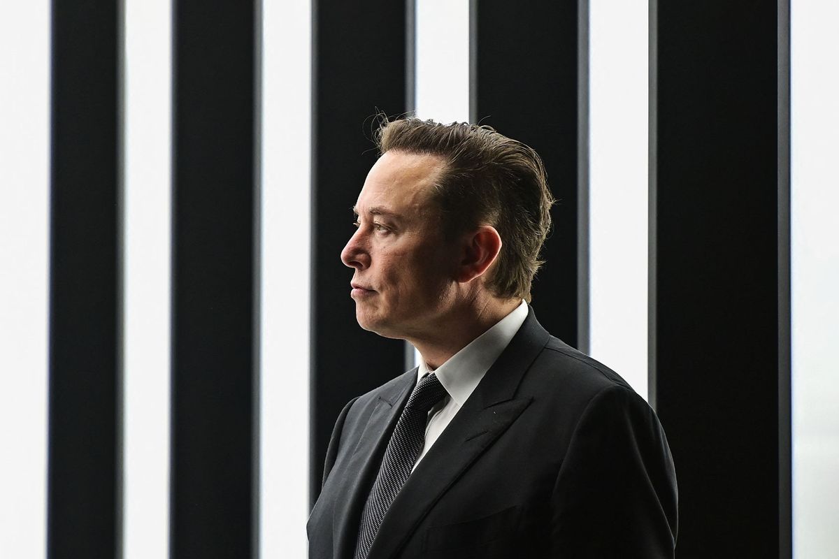 Tesla CEO Elon Musk is pictured as he attends the start of the production at Tesla's "Gigafactory" on March 22, 2022 in Gruenheide, southeast of Berlin. - US electric car pioneer Tesla received the go-ahead for its "gigafactory" in Germany on March 4, 2022, paving the way for production to begin shortly after an approval process dogged by delays and setbacks. (PATRICK PLEUL/POOL/AFP via Getty Images)