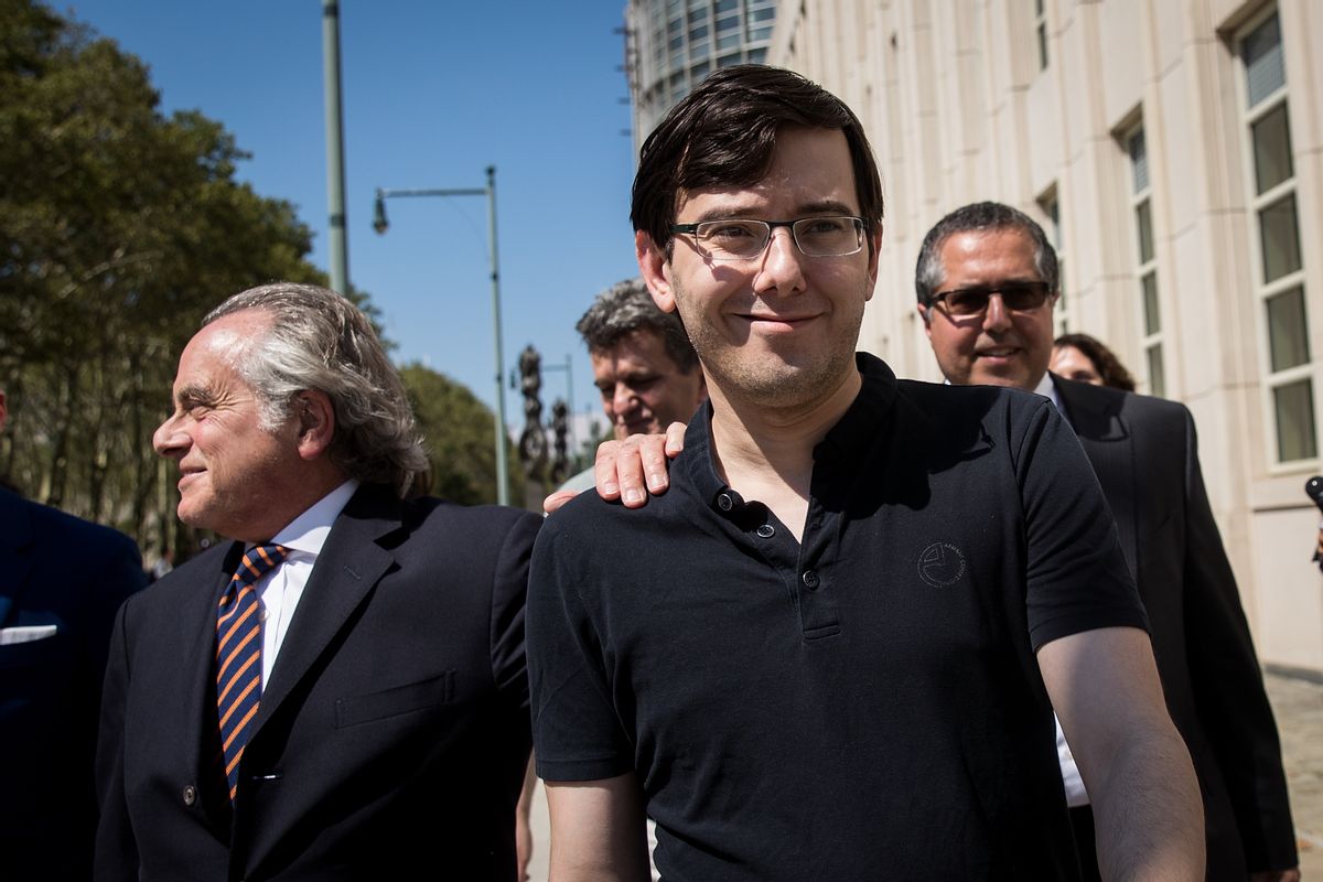 Lead defense attorney Benjamin Brafman walks with former pharmaceutical executive Martin Shkreli after the jury issued a verdict at the U.S. District Court for the Eastern District of New York, August 4, 2017 in the Brooklyn borough of New York City. Shkreli was found guilty on three of the eight counts involving securities fraud and conspiracy to commit securities and wire fraud.  (Photo by Drew Angerer/Getty Images)