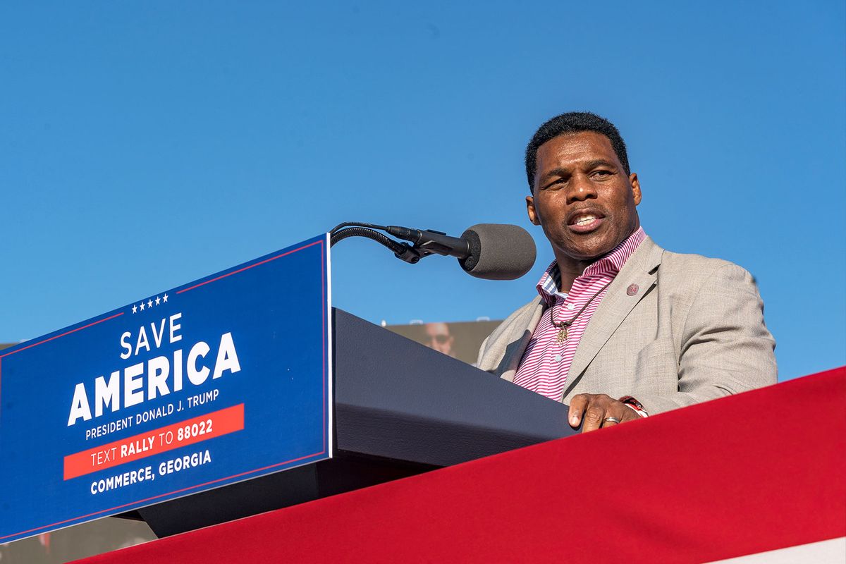 Former Heisman Trophy winner and candidate for US Senate Herschel Walker (R-GA) speaks to supporters of former U.S. President Donald Trump during a rally at the Banks County Dragway on March 26, 2022 in Commerce, Georgia. This event is a part of Trump's Save America Tour around the United States. (Megan Varner/Getty Images)