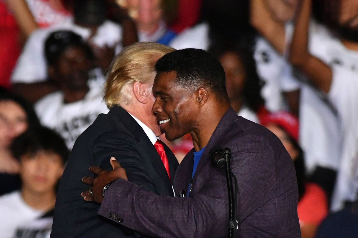 Republican Senate candidate Herschel Walker and former president Donald J Trump hold a Save America rally in Perry, GA, United States on September 25, 2021 (Peter Zay/Anadolu Agency via Getty Images)