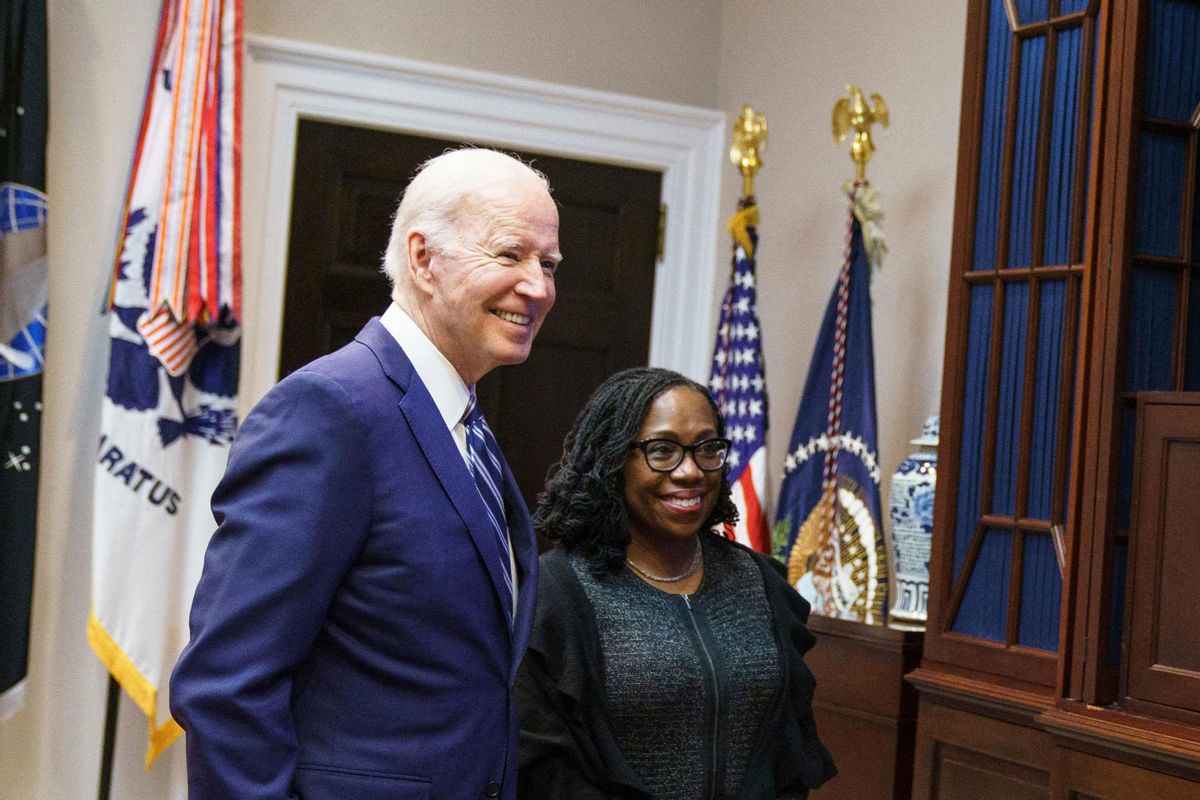 US President Joe Biden and Judge Ketanji Brown Jackson watch the Senate vote on her nomination to be an associate justice on the US Supreme Court, from the Roosevelt Room of the White House in Washington, DC on April 7, 2022. (MANDEL NGAN/AFP via Getty Images)