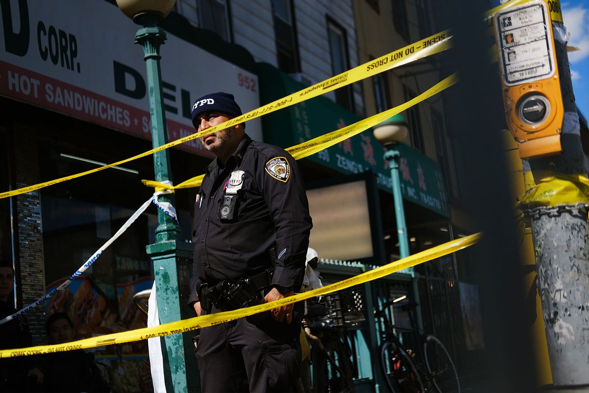 Police gather at the scene of a shooting at the 36 St subway station on April 12, 2022 in the Brooklyn borough of New York City. According to authorities, at least 29 people were reportedly injured, including 10 with gunshot wounds, during a shooting at the 36th Street and Fourth Avenue station in the Sunset Park neighborhood. (Spencer Platt/Getty Images)
