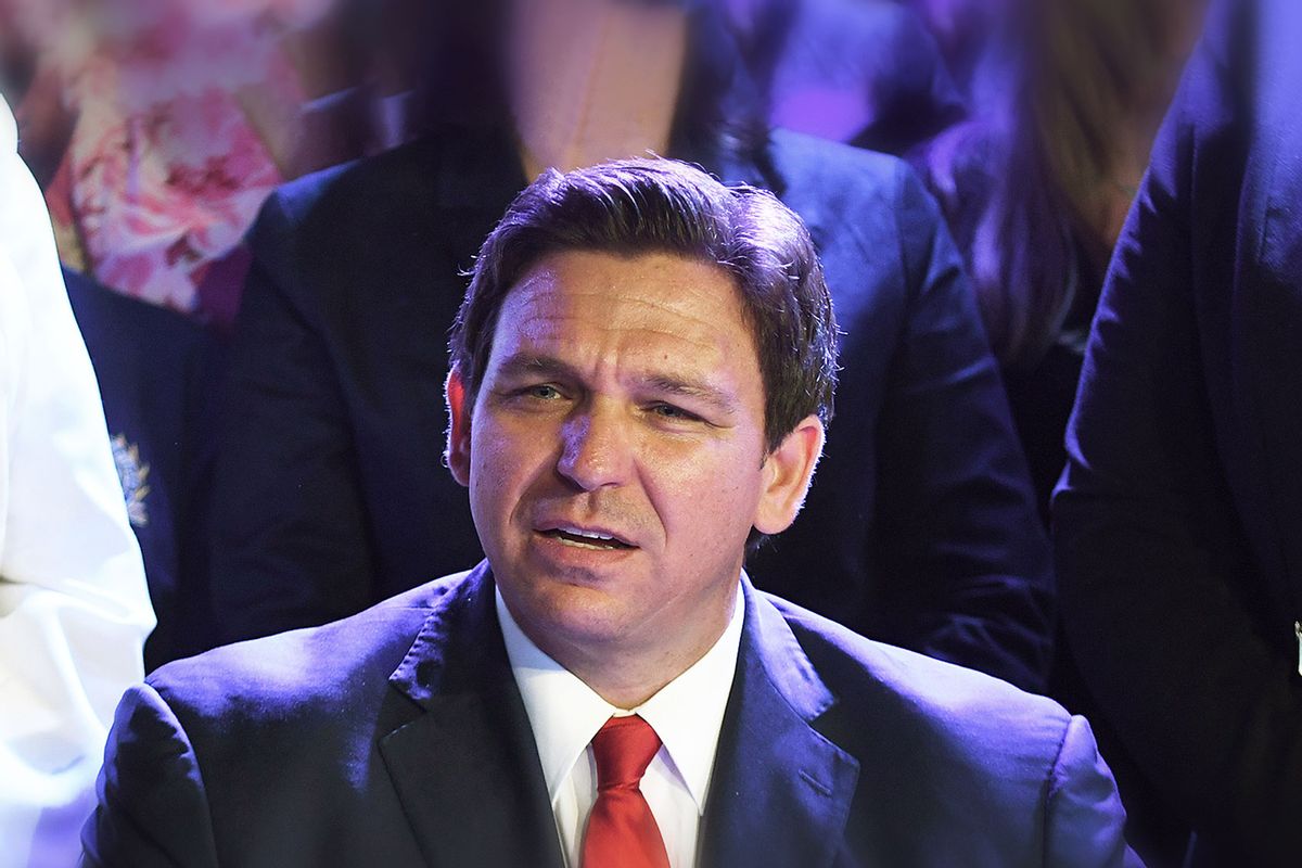 Governor Ron DeSantis signs Florida's 15-week abortion ban into law at Nacion de Fe Church in Kissimmee. The law, which goes into effect July 1, bans the procedure after 15 weeks of pregnancy without exemptions for rape, incest or human trafficking, but does allow exemptions in cases where a pregnancy isa serious risk to the mother or a fatal abnormality is detected if two physicians confirm the diagnosis in writing.  (Paul Hennessy/SOPA Images/LightRocket via Getty Images)