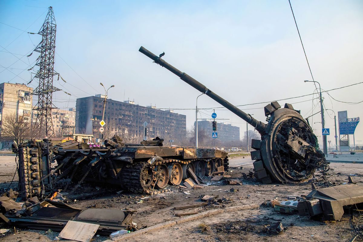 A destroyed tank likely belonging to Russia / pro-Russian forces lies amidst rubble in the north of the ruined city. The battle between Russian / Pro Russian forces and the defencing Ukrainian forces lead by Azov battalion continues in the port city of Mariupol. (Maximilian Clarke/SOPA Images/LightRocket via Getty Images)