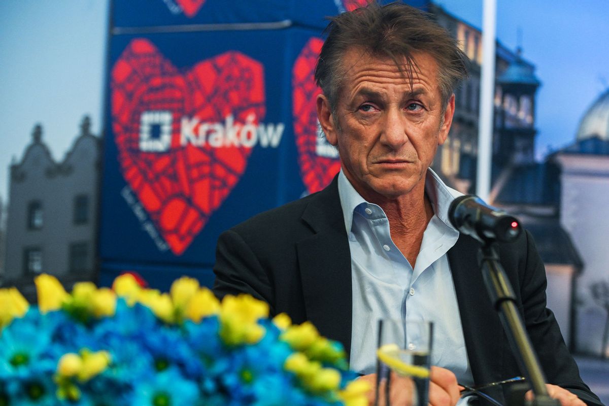 Sean Penn and the Mayor of Krakow, Jacek Majchrowski (not seen) speak to the press after signing a humanitarian contract at the City Hall on March 23, 2022 in Krakow, Poland. Sean Penn founded the CORE (Community Organized Relief Effort) foundation in 2010 to help the victims of the Haiti earthquake, and it is now assisting Ukrainian refugees in Poland. (Omar Marques/Getty Images)