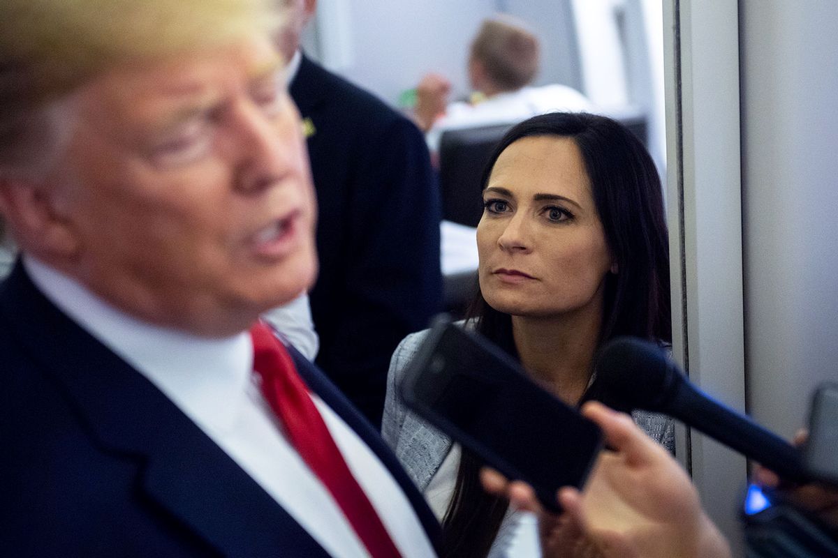 White House Press Secretary Stephanie Grisham listens as US President Donald Trump speaks to the media aboard Air Force One while flying between El Paso, Texas and Joint Base Andrews in Maryland, August 7, 2019. (SAUL LOEB/AFP via Getty Images)