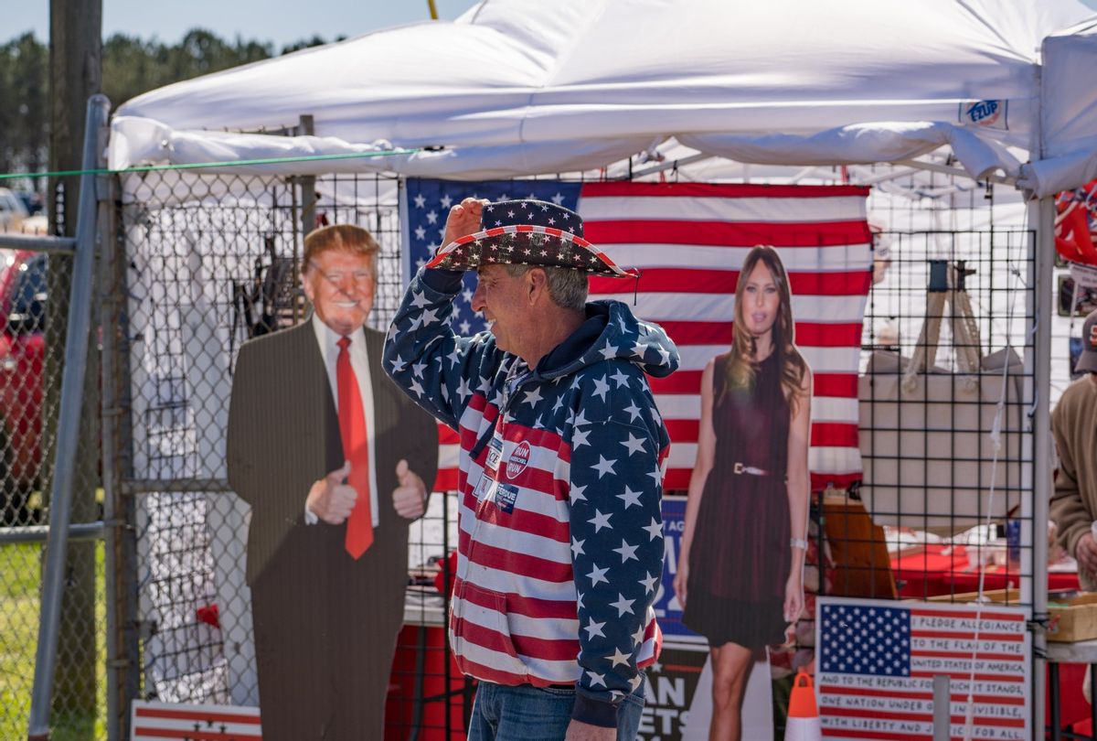 Supporters of former U.S. President Donald Trump wait for a rally at the Banks County Dragway on March 26, 2022 in Commerce, Georgia. This event is a part of Trump's "Save America Rally" around the United States where several current Republican candidates or politicians have been announced to speak at the event. (Photo by Megan Varner/Getty Images)
