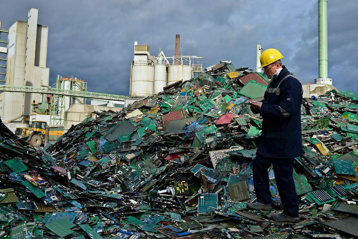 Electronic components including circuit boards sit in a pile ahead of recycling at Aurubis AG on February 7, 2014 in Luenen, Germany. (Sascha Schuermann/Getty Images)