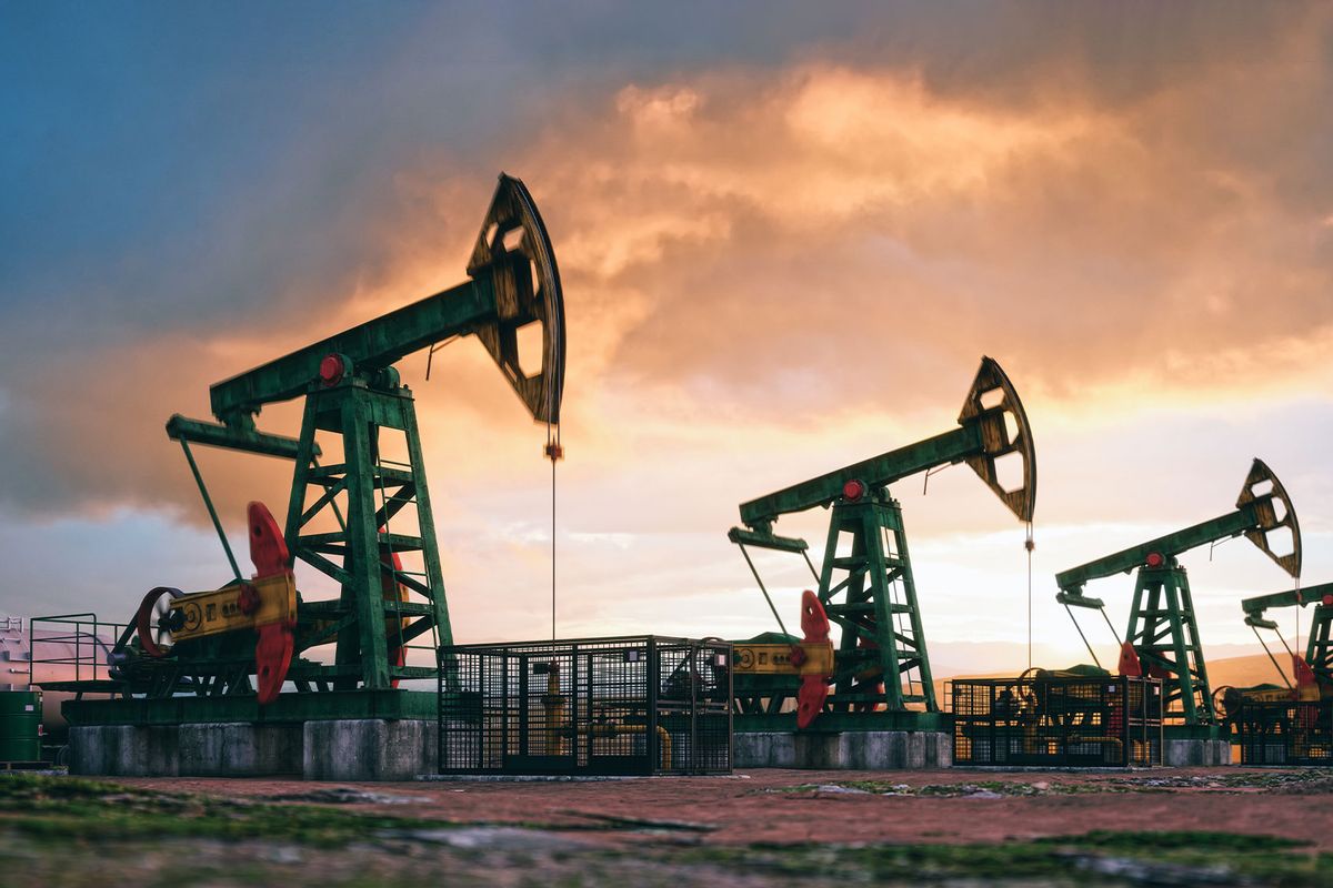 Working oil pumps against a sunset sky (Getty Images/imaginima)