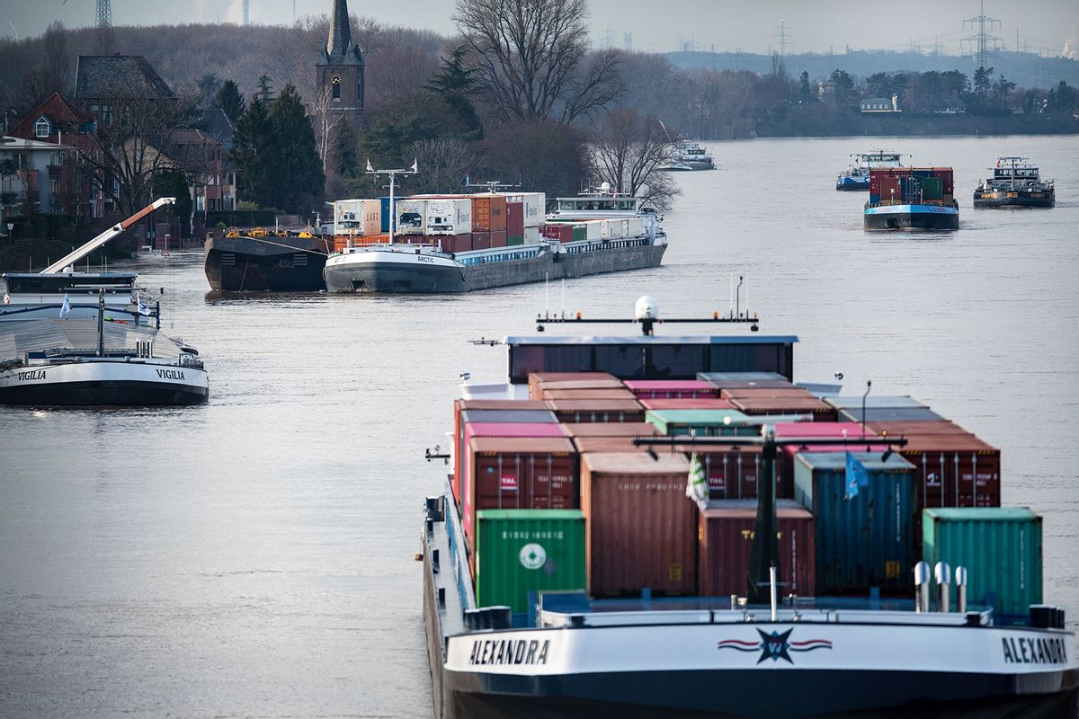 Cargo ships anchor on the Rhine near Bonn harbour. Navigation on the Rhine in Cologne has been suspended due to the high water. (Marius Becker/picture alliance via Getty Images)