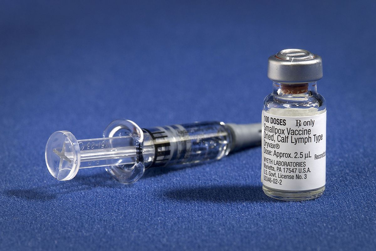 The smallpox vaccine diluent in a syringe along side a vial of Dryvax® dried smallpox vaccine, 2002. (Smith Collection/Gado/Getty Images)