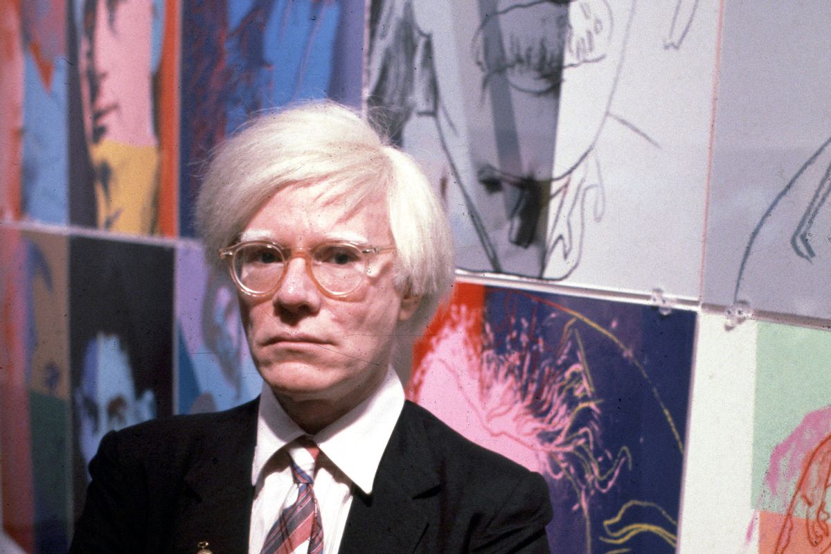 The American artist and filmmaker Andy Warhol with his paintings(1928 - 1987), December 15, 1980. (Getty Images / Susan Greenwood / Liaison Agency)