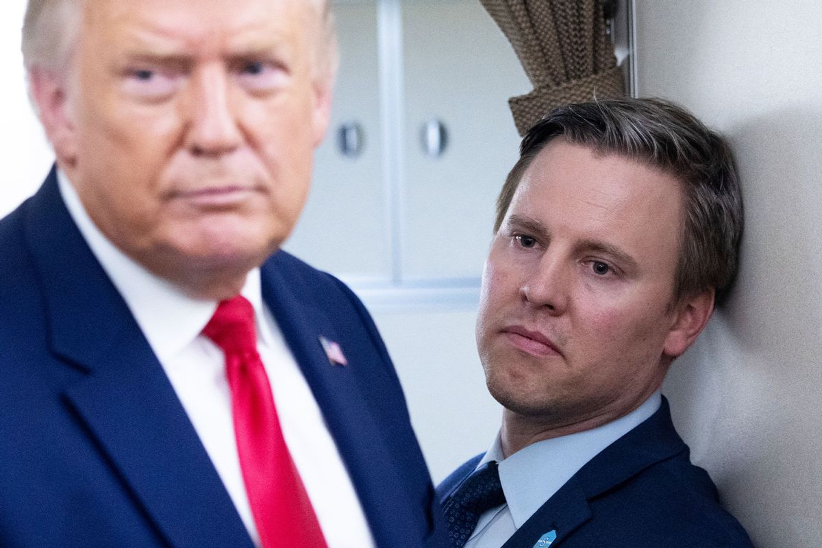 Campaign manager Bill Stepien stands alongside US President Donald Trump as he speaks with reporters aboard Air Force One as he flies from Manchester, New Hampshire to Joint Base Andrews in Maryland, August 28, 2020, following a campaign rally. (SAUL LOEB/AFP via Getty Images)