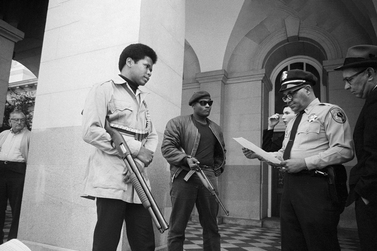 Two members of the Black Panther Party are met on the steps of the State Capitol in Sacramento, May 2, 1967, by Police Lt. (Getty Images/Bettmann / Contributor)
