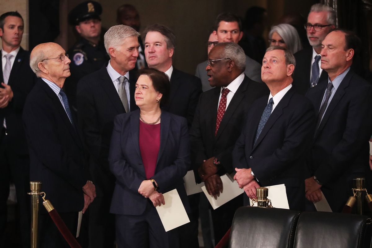 Justices of the U.S. Supreme Court including (L-R) Associate Justices Stephen Breyer, Neil Gorsuch, Elena Kagan, Brett Kavanaugh, Clarence Thomas, Chief Justice John Roberts and Associate Justice Samuel Alito (JONATHAN ERNST/AFP via Getty Images)