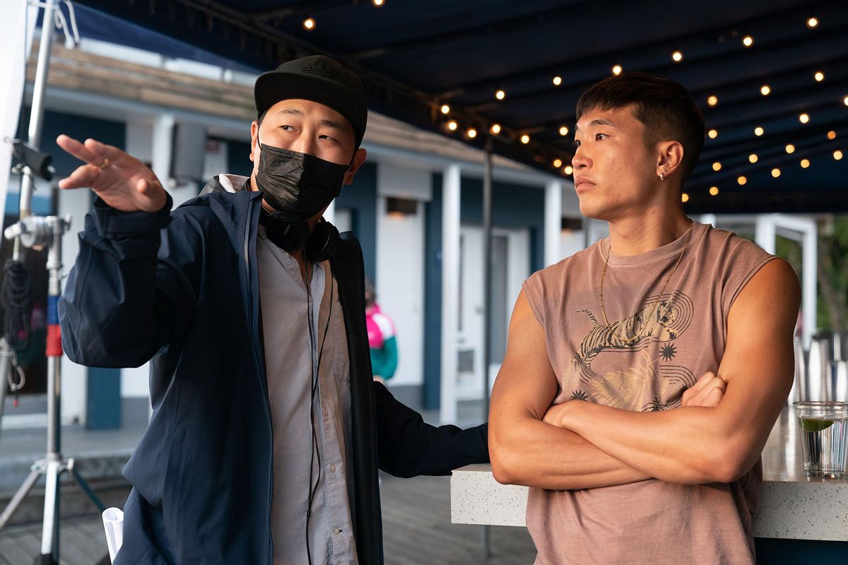 Director Andrew Ahn and Noah (Joel Kim Booster) behind the scenes of "Fire Island" (Jeong Park/Searchlight)