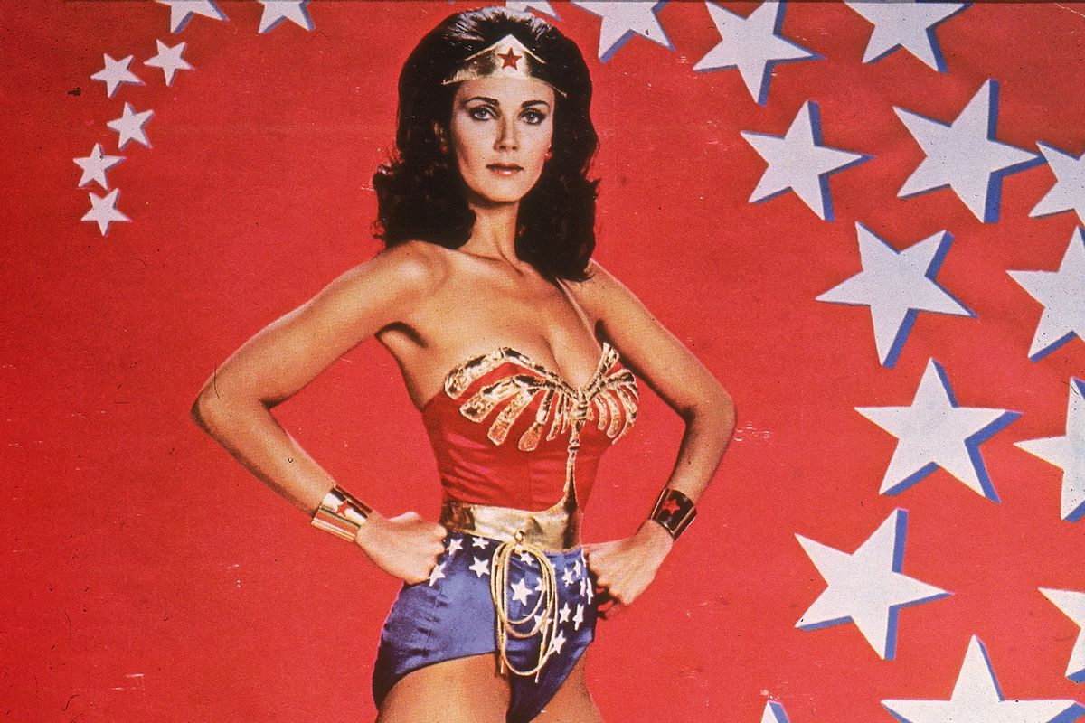 Promotional portrait of American actor Lynda Carter in costume in front of a backdrop of stars for the television series, 'Wonder Woman,' 1976. (Hulton Archive/Getty Images)