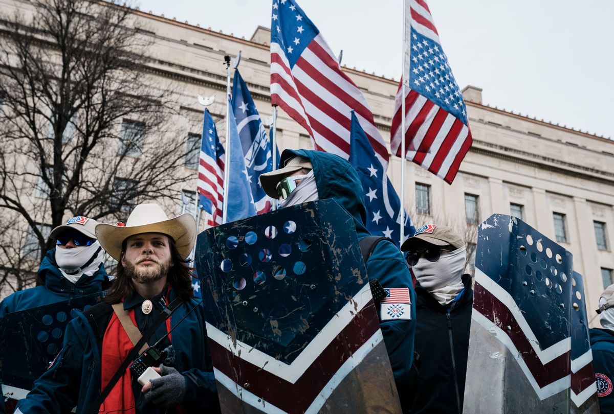 Members of the right-wing group, the Patriot Front, and their founder, Thomas Ryan Rousseau, second from left, prepare to march with anti-abortion activists during the 49th annual March for Life along Constitution Ave. on Friday, Jan. 21, 2022 in Washington, DC.  (Kent Nishimura / Los Angeles Times via Getty Images)